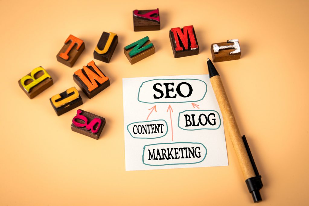SEO Concept. BLOG CONTENT MARKETING. Note sheet with text and chart.